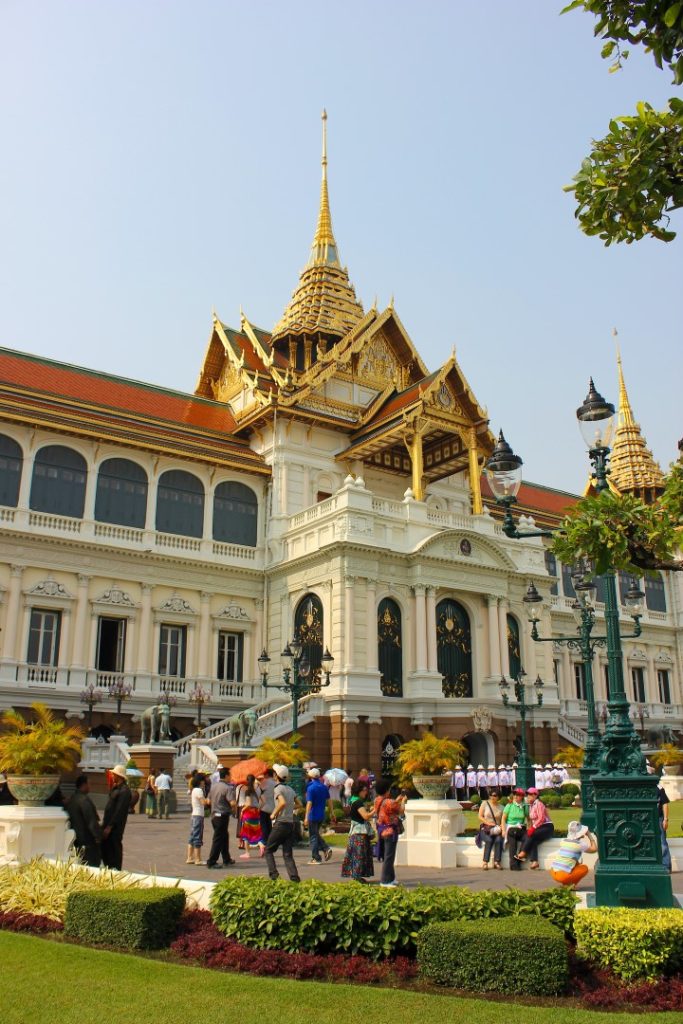 Crowds gather outside the Grand Palace.